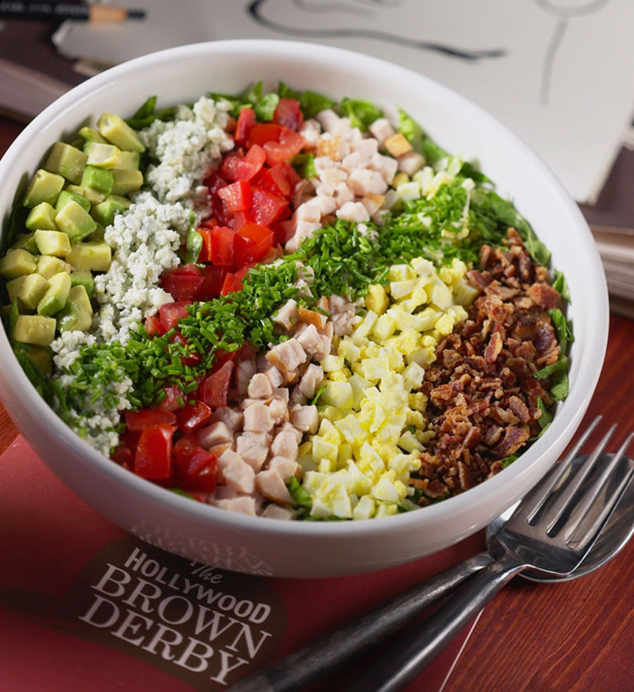 FROM DISNEY PARKS BLOG Inspired by the historic Hollywood locale, this signature dining location features three items from the original menu: the famous cobb salad, grapefruit cake and the Shirley Temple cocktail. https://disneyparks.disney.go.com/blog/2018/05/celebrate-the-29th-anniversary-of-disneys-hollywood-studios-with-these-fun-facts/