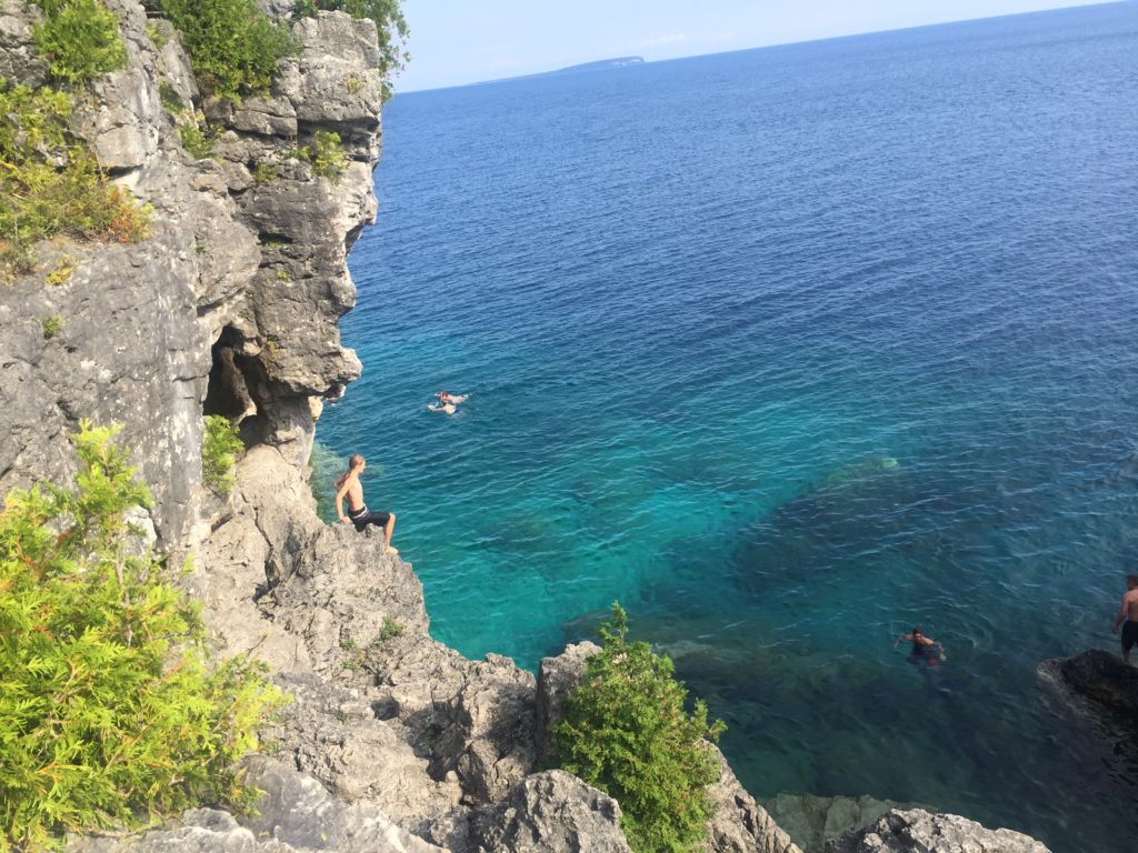 man on Rock Face at the Grotto