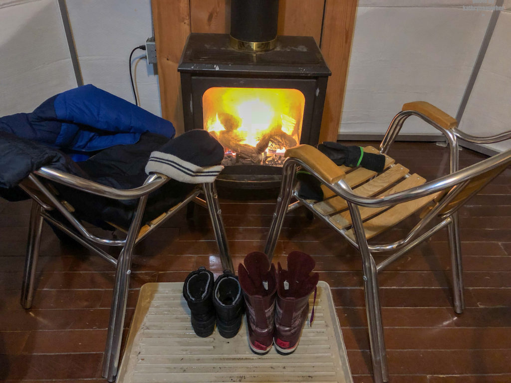 Inside yurt #60, keeping boats and socks and mitts dry and warm while winter camping at MacGregor Point Provincial Park in February #findyourselfhere #macgregorpointprovincialpark #macgregorpoint #macgregorpp #ontarioparks #yurtcamping #wintercamping #outdoors #adventureparenting #portelgin #brucepeninsula