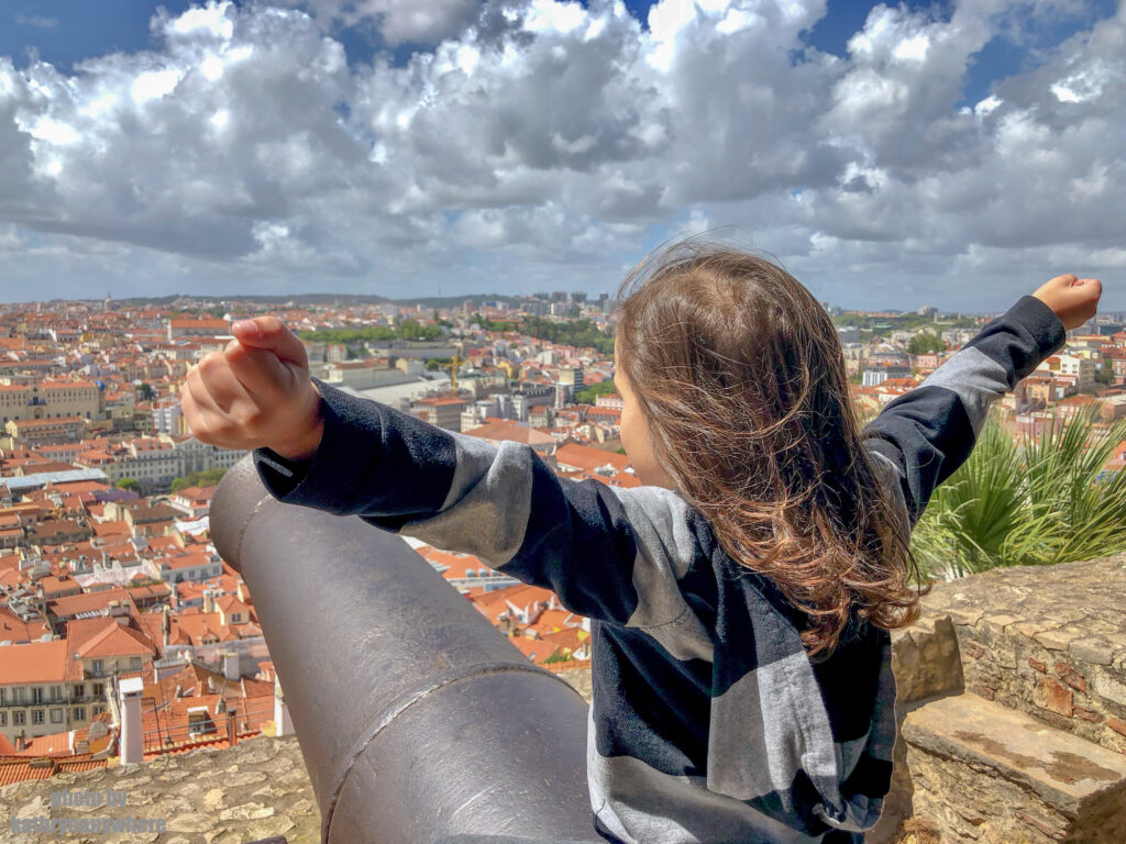 Little Man riding a canon at Castelo Sao Jorge in Lisbon, Portugal
