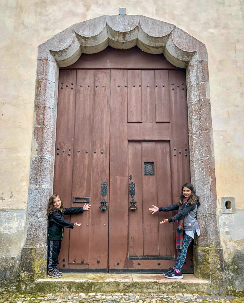 The doors of Lisbon, Barcelona and Paris. This door my kids are posing in front of is from the town of Sintra, close to Pena Palace in the Lisboa province.