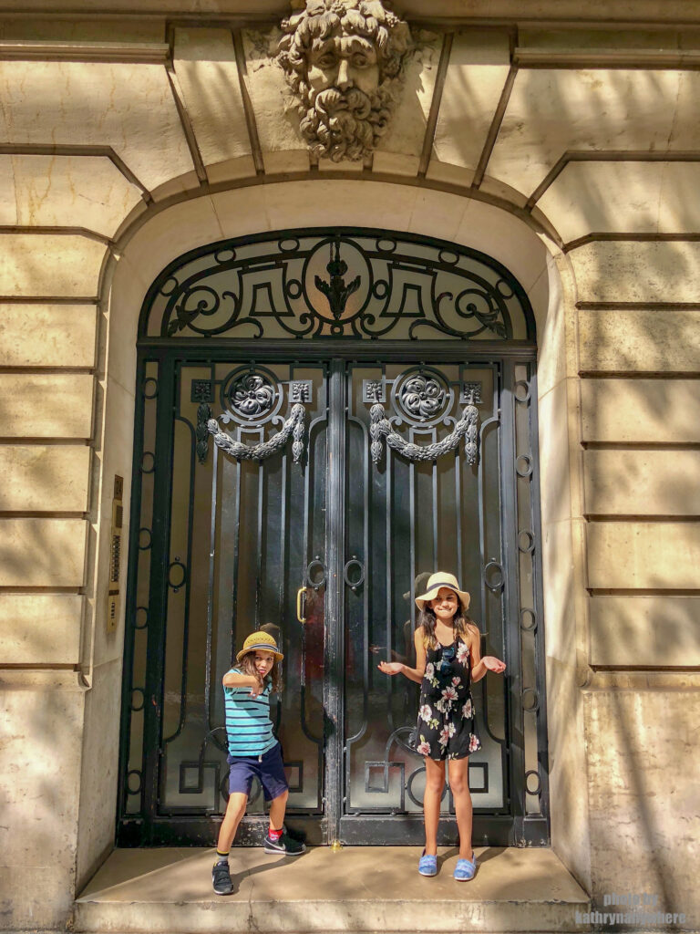 This glass door picture with my children was taken in 7th arrondissement neighbourhood in Paris, France