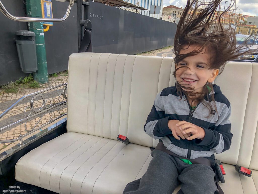 Little Man enjoying his tuk tuk ride to the district of Belem in Lisbon, Portugal