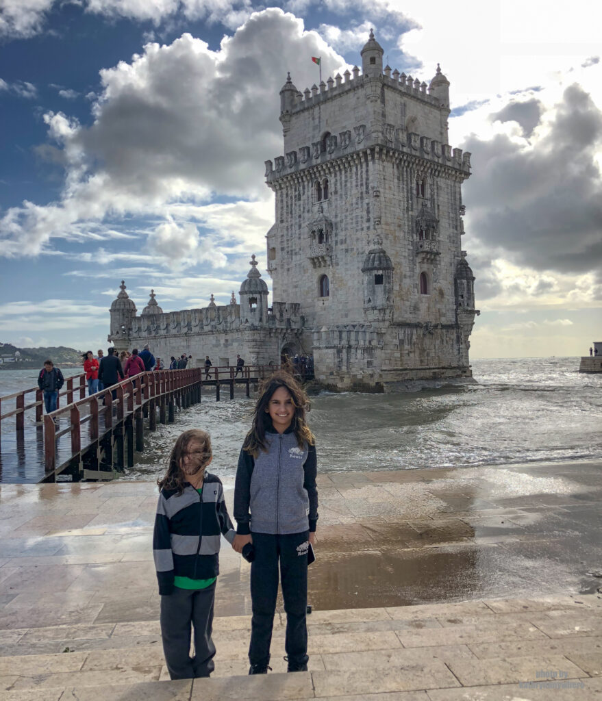 The kids outside the tower of Belem in Lisbon, Portugal. Belém Tower is a UNESCO World Heritage Site played a key role in Europe’s Age of Discoveries, since it served both as a fortress and as a port from where Portuguese explorers departed to establish what would be the first European trade in history with China and India.