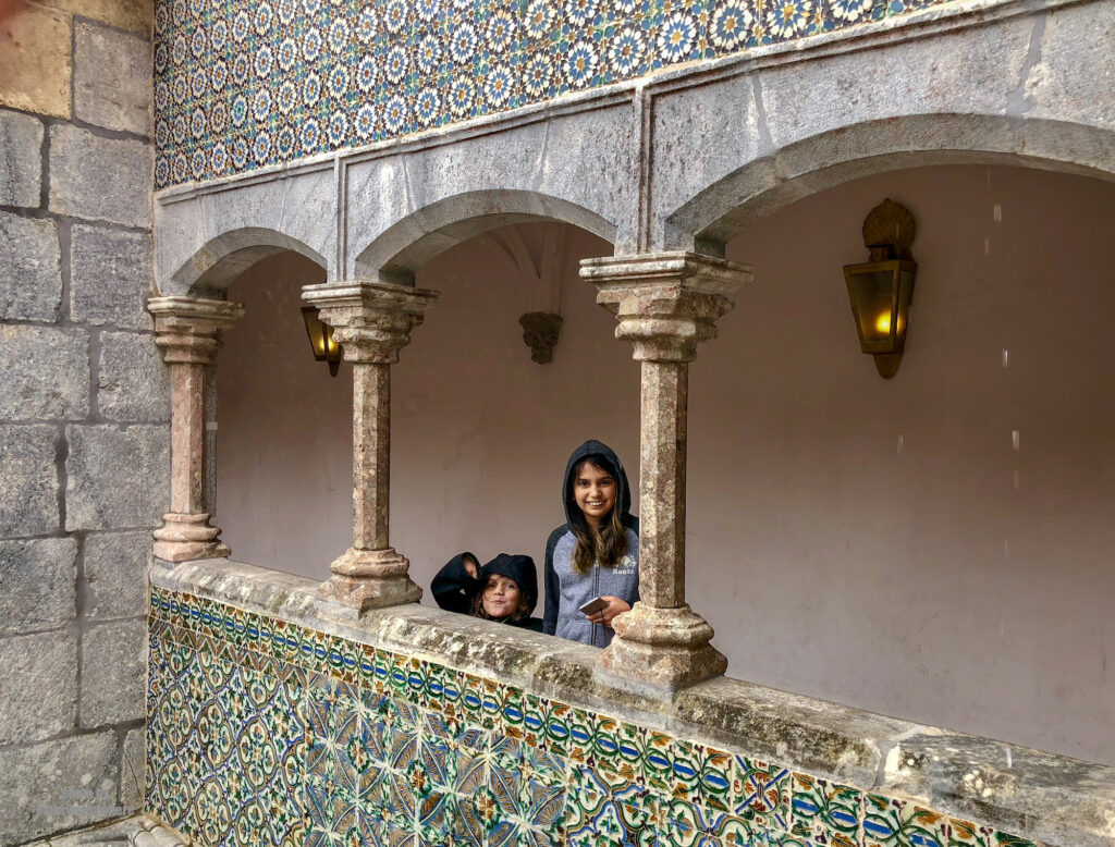 my kids inside Pena Palace on the rainy tour