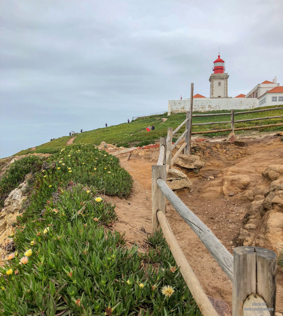 The Cabo da Roca Lighthouse is a beacon/lighthouse located 165 metres above the Atlantic Ocean, on Portugal's most westerly extent. It is located in the civil parish of Colares, in the municipality of Sintra, situated on a promontory that juts out into the ocean, made up of granite boulders and interspersed limestone.