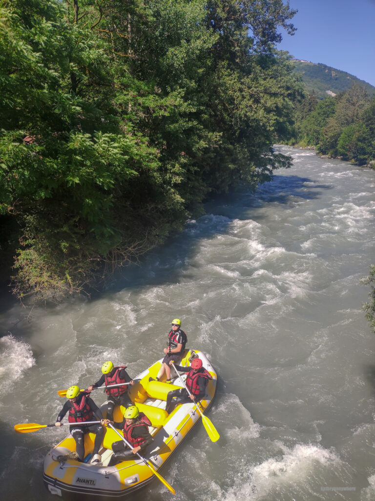 Our raft sailing down the river. Good times on the Isere River in the French Alps.