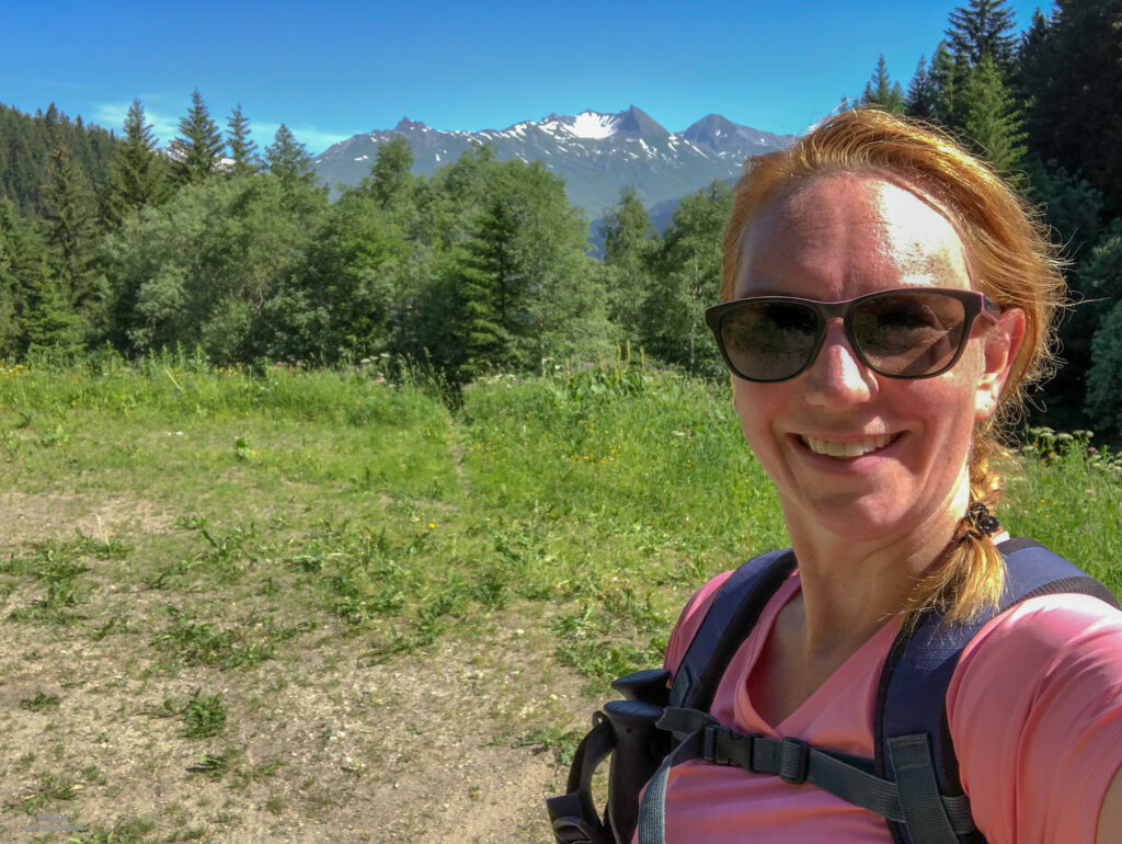 Red faced selfie hiking the red level hike in the French Alps. More adventure self care.