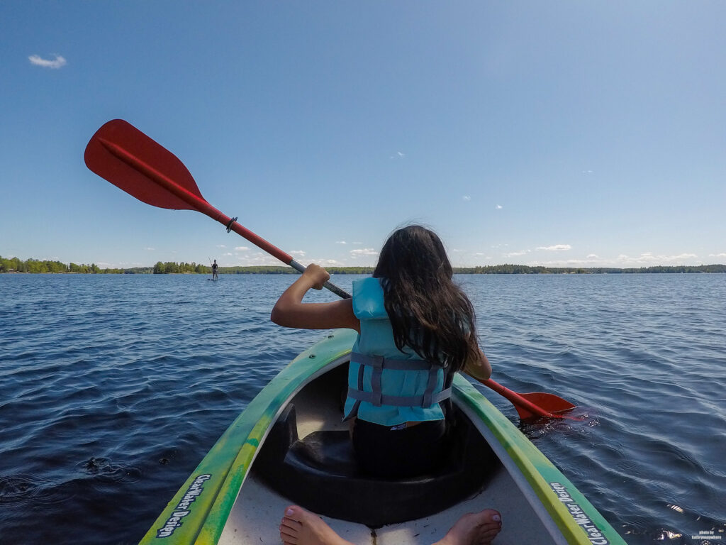 My daughter and I on a kayak together on Stoney Lake, Ontario