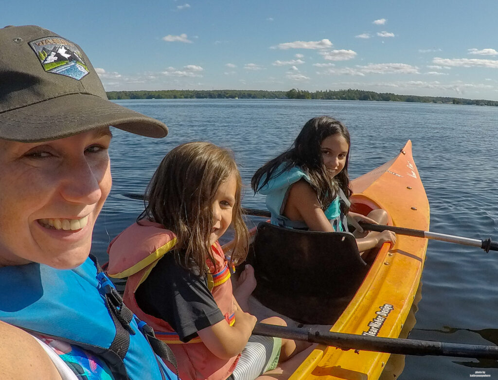 My kids and I all in a kayak together on Stoney Lake