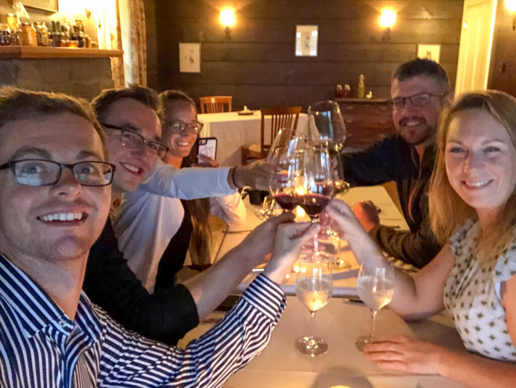 Five travel writers in the midst of a 7 course meal at Mount Julian at Viamede Resort