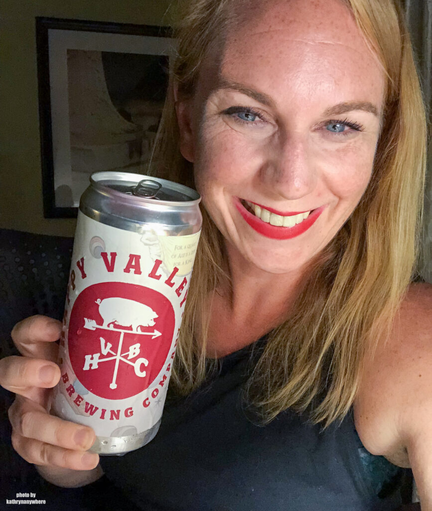A summer session springtail ale in a tall can from Happy Valley Brewing Company with a tanned and happy me