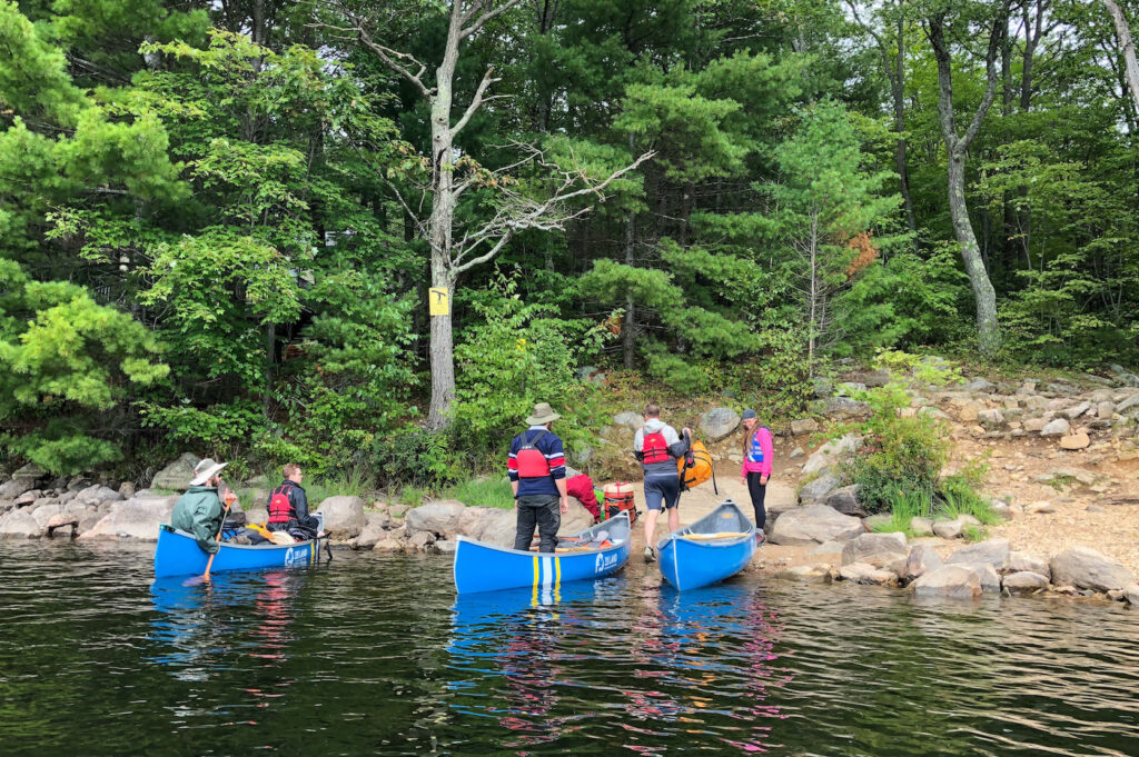 Unloading our first portage and from Anstruther Lake to Rathbun Lake