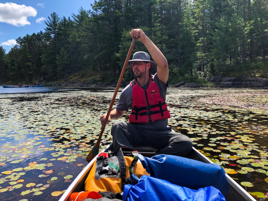 My steady stern, Kevin Wagar from the Wandering Wagars in our canoe in Serpentine Lake.