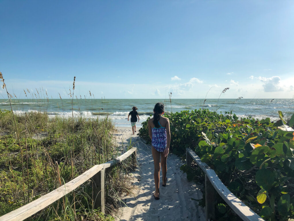 walking to the beach from island inn
