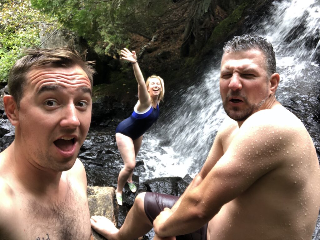 Strange waterfall picture of Kat from KathrynAnywhere with Chris and Kevin. Photo by Chris Mitchell from Traveling Mitch