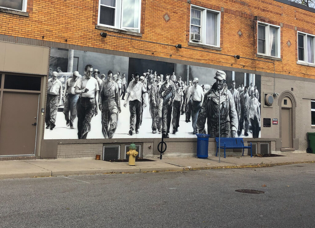 An homage to the autoworkers of Windsor, Ontario in street art. Ford City area of Windsor, Ontario. 