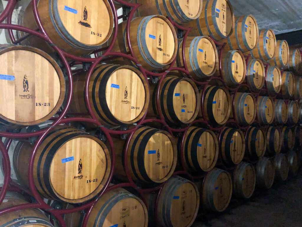 in the basement of Arrowhead Springs Winery - barrels and barrel of their wine in Niagara Wine Country, New York