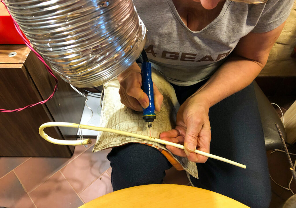 Having my name carved into my walking stick 