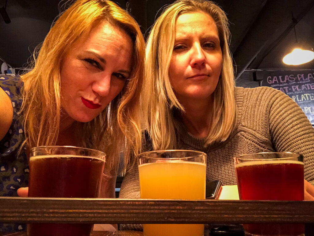 Kasia Writes and I enjoying our beer tour of Riga