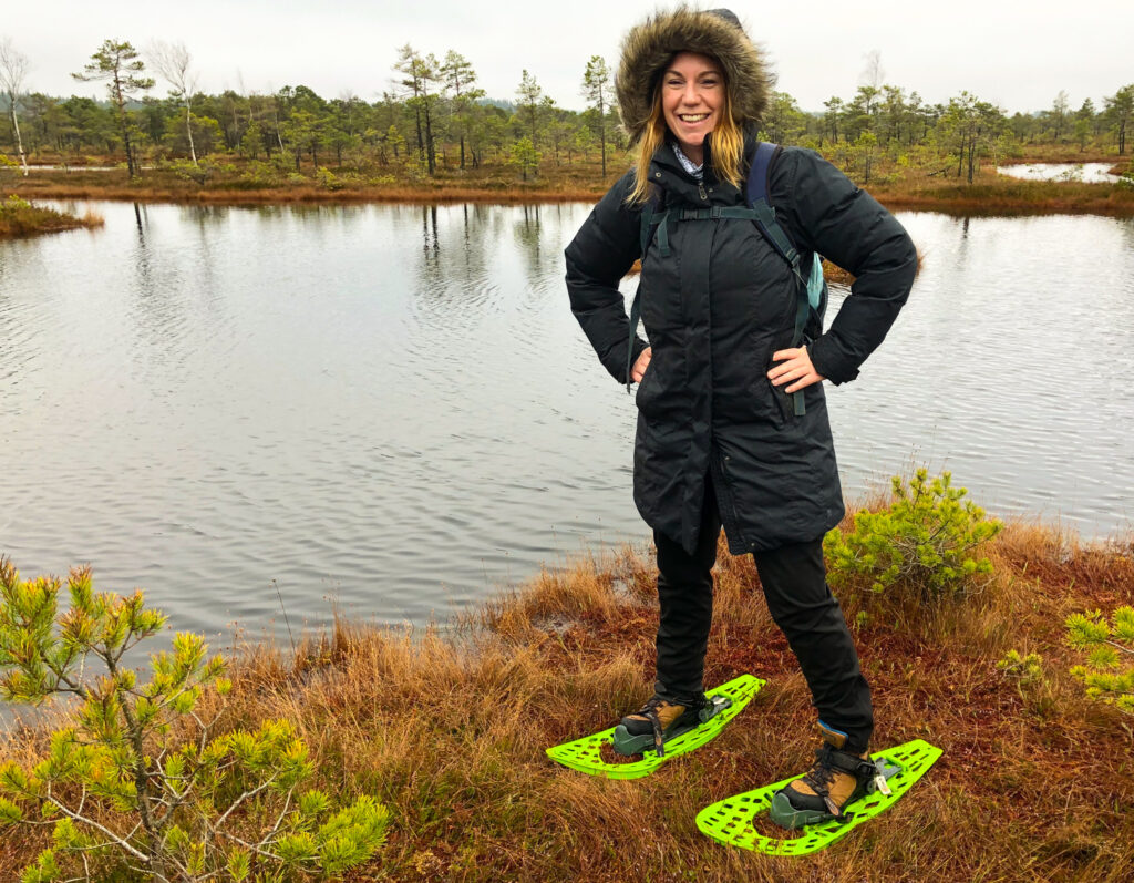 Bog shoeing activity outside of Riga, Latvia. I'm in a bog wearing something like snowshoes so we don't fall in 