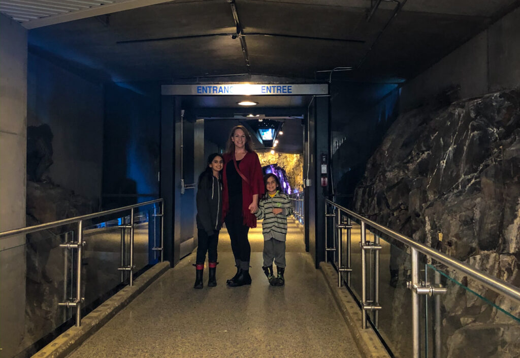 Sudbury Winter Activities - kids and the author in the entrance to Science North in Sudbury