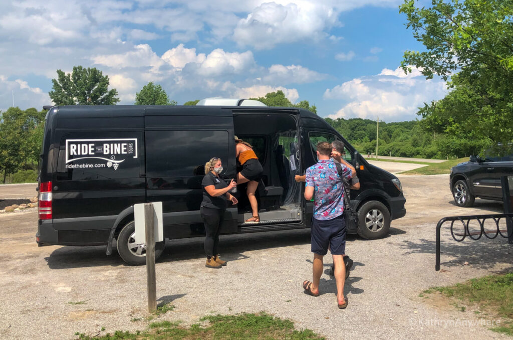 Boarding the Ride The Bine van with hand sanitizer