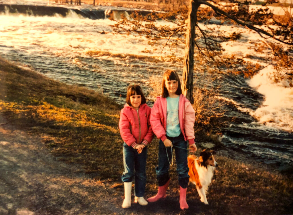 The author with sister and dog as children