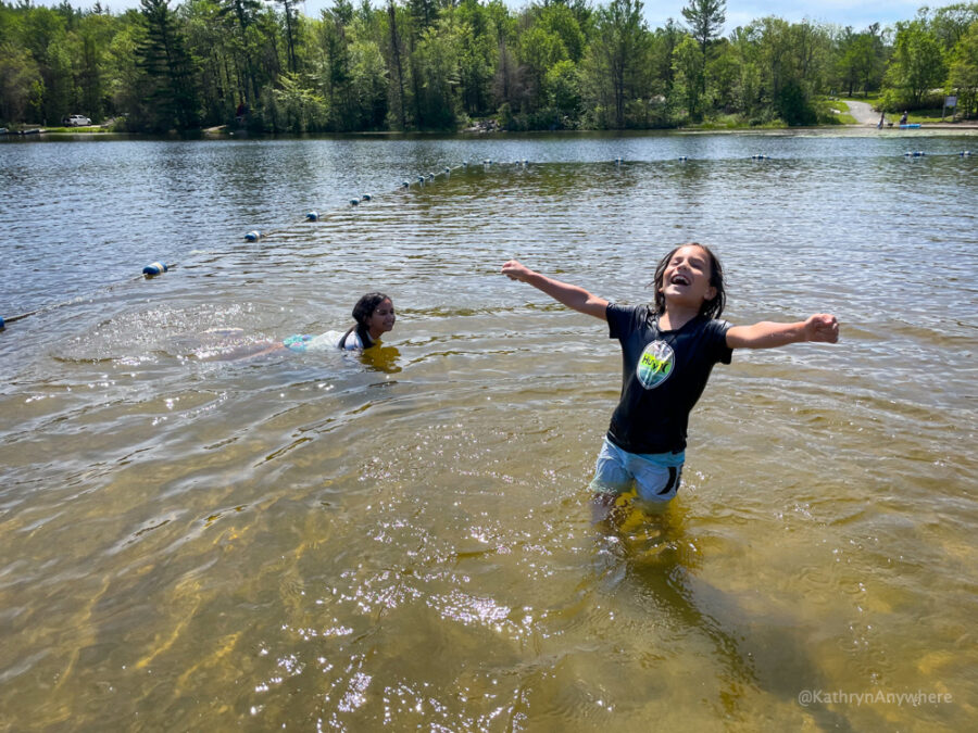 Six Mile Lake Provincial Park beach with kids playing