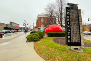 Leamington Town Sign and the iconic tomato in the town