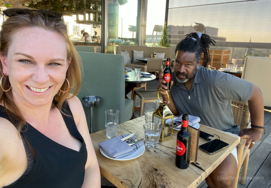 Chris Rudder and I with Estrella Damm beer at Harriet's rooftop patio and bar on top of 1Hotel Toronto