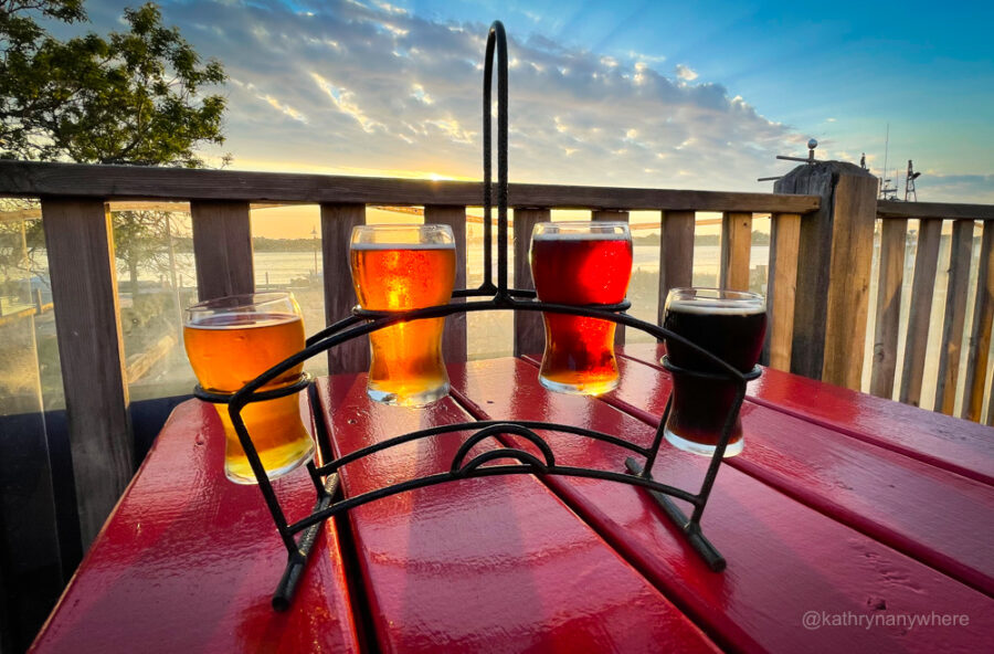 Beer flight at Rudder's Seafood and brew pub in Yarmouth at Sunset on the patio