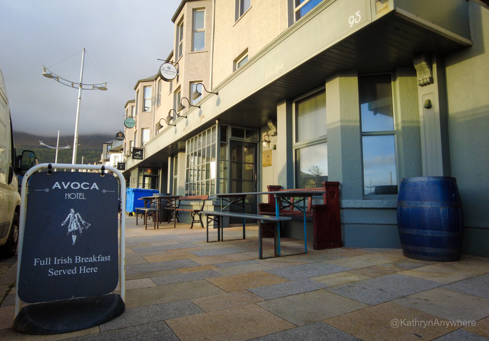 Exterior Avoca hotel morning, sign for Irish Breakfast on sidewalk