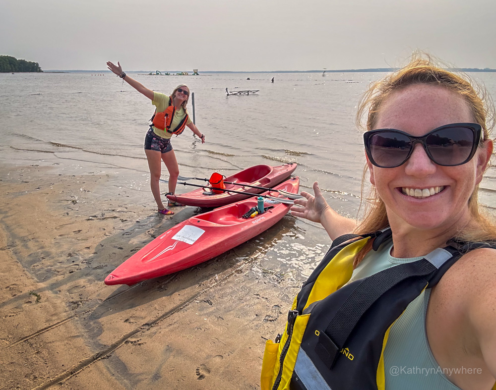 Oka National Park kayaks on the beach - Kat and Lindz with kayaks