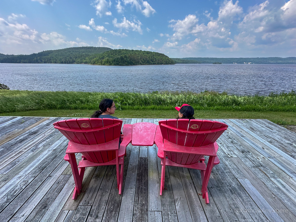 Obadjiwan-Fort Temiscamingue kids sitting on parks canada red chairs Témiscamingue and Abitibi-Ouest in Abitibi-Témiscamingue