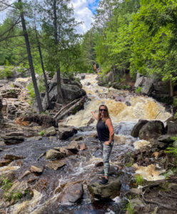 North Bay Duchesnay Falls Kat at the waterfall in summer in North Bay Ontario