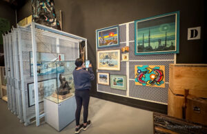 Things to do in Rouyn-Noranda Abitibi-Témiscamingue Rouyn-Noranda MA Musee d'art interior girl using iPad to identify art