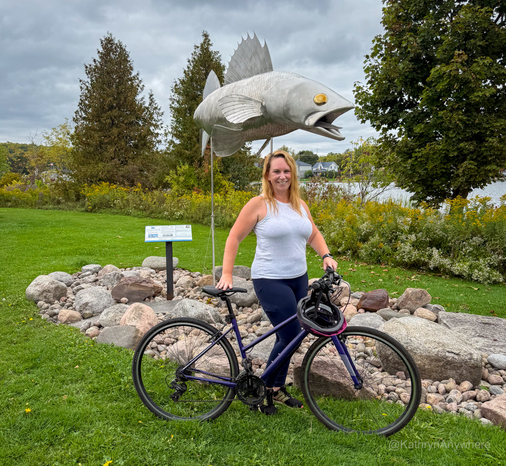 Hastings Trans Canada Trail pose with Pieces Pete, a giant walleye in the village of Hastings